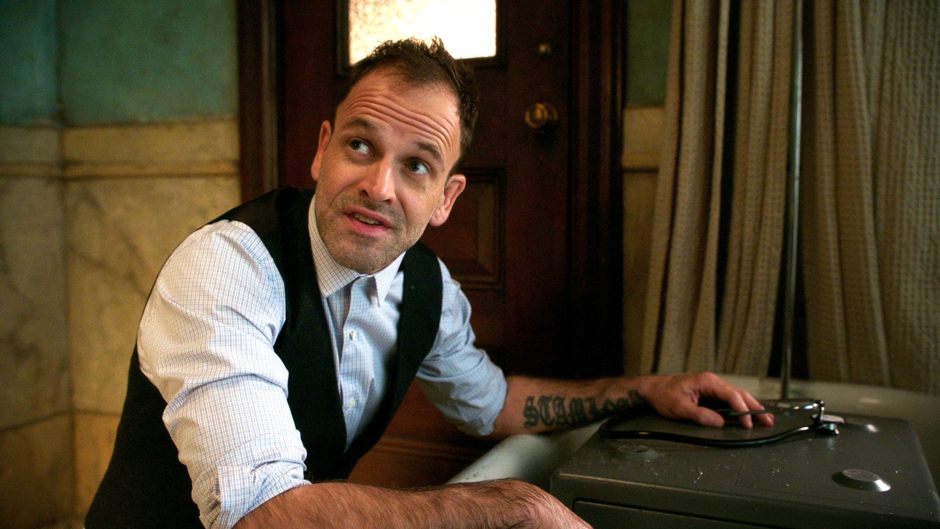 Backdrop poster for Elementary (2012)
