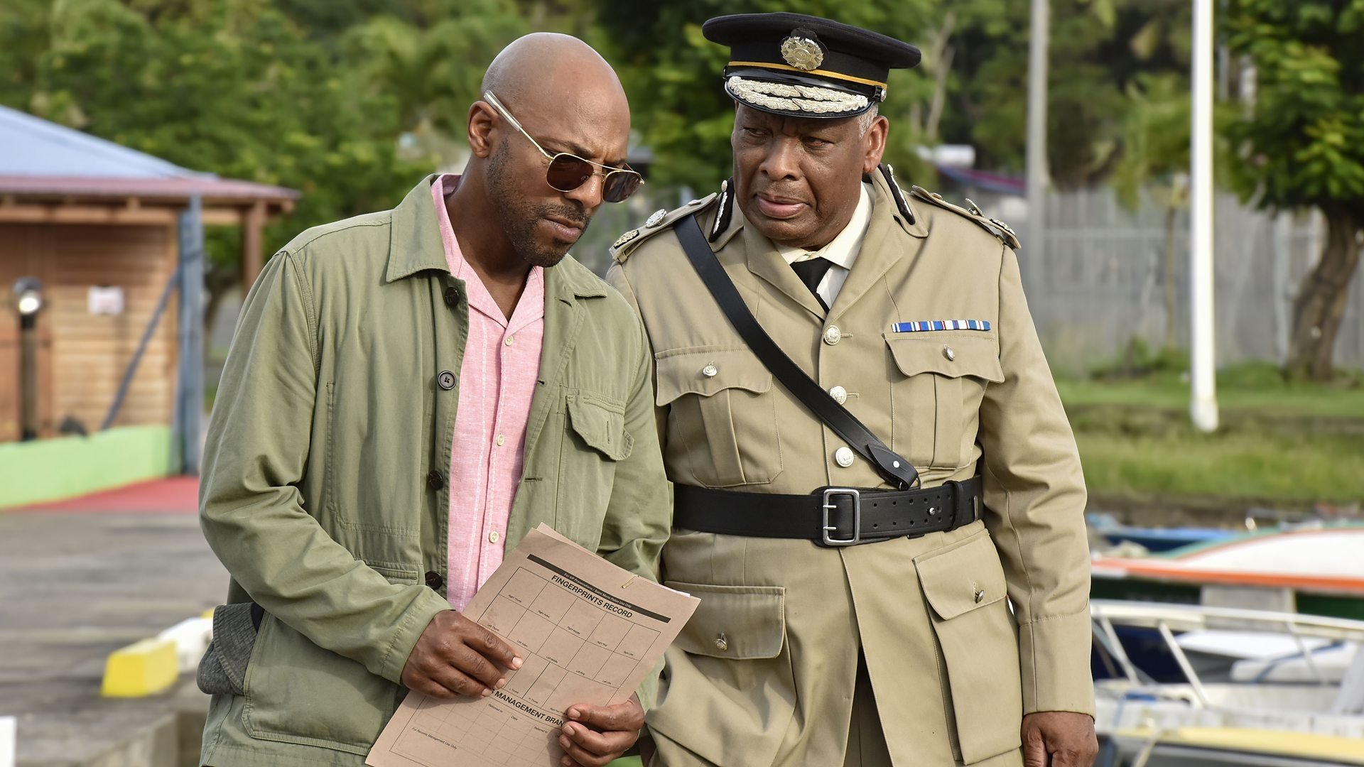 Backdrop poster for Death in Paradise (2011)